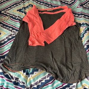 Pink sleeves and grey shirt